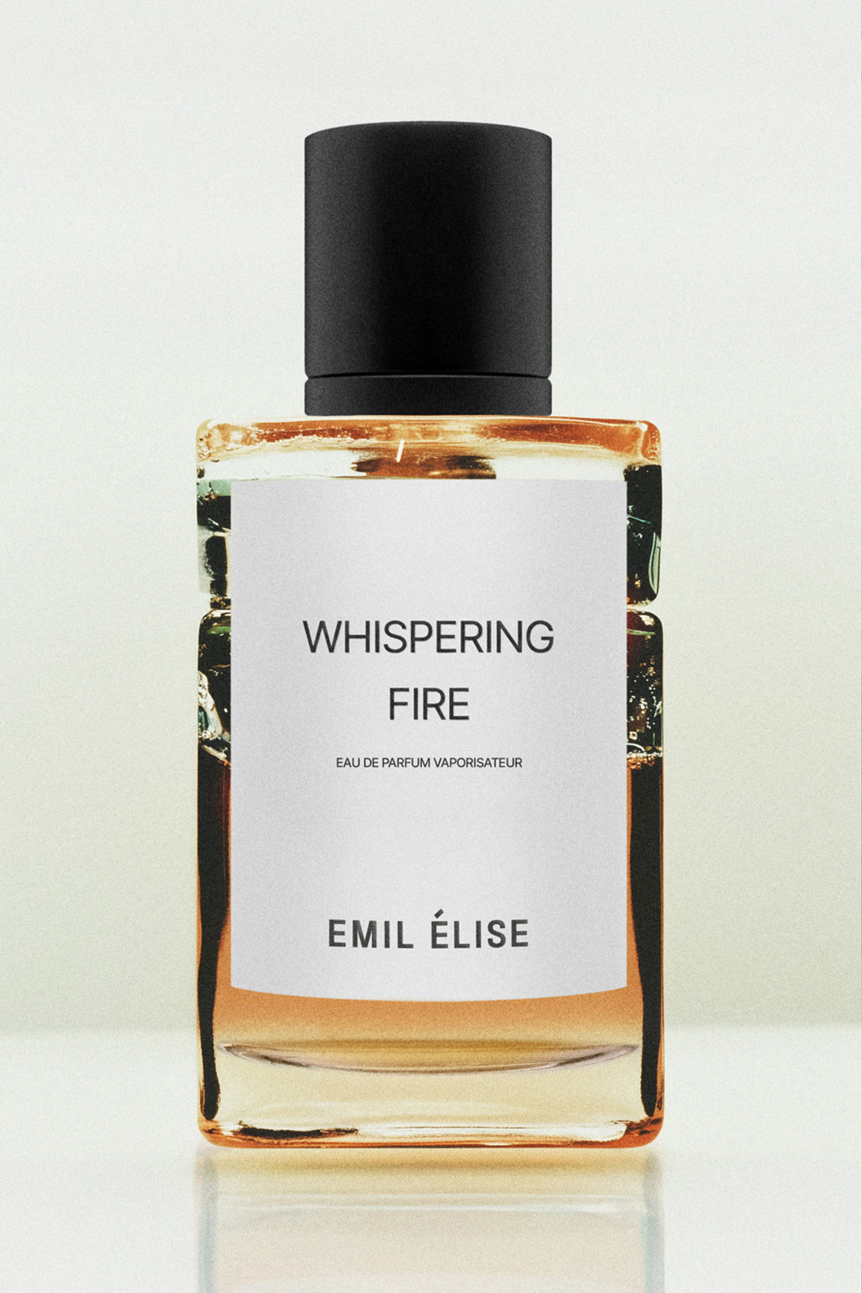 Emil Élise Whispering Fire Eau de Parfum 100 ml gintaro spalvos buteliukas juodu dangteliu